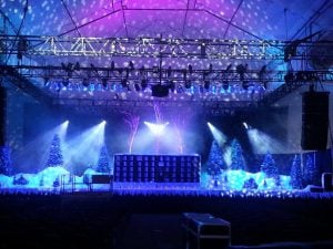 stage lit with blue LED moving lights