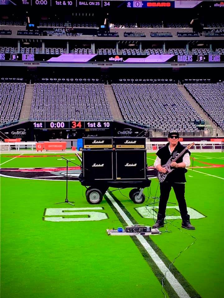 Neal Schon from Journey performs the National Anthem using our Marshall amps and cabs before the Raiders vs Bears game